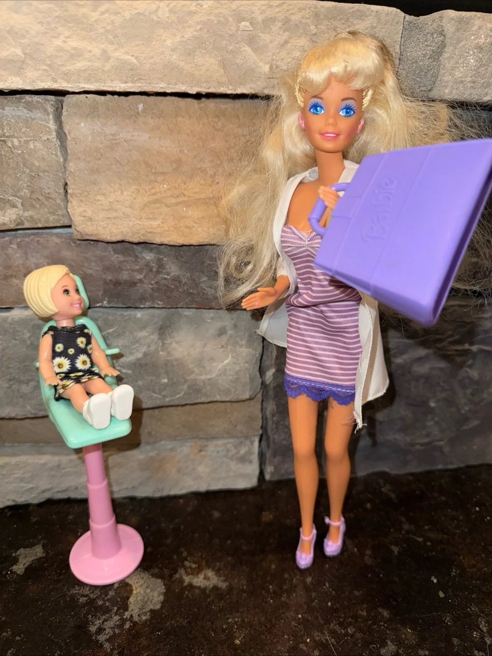 Dr Barbie outfit patient chair and small child missing tooth